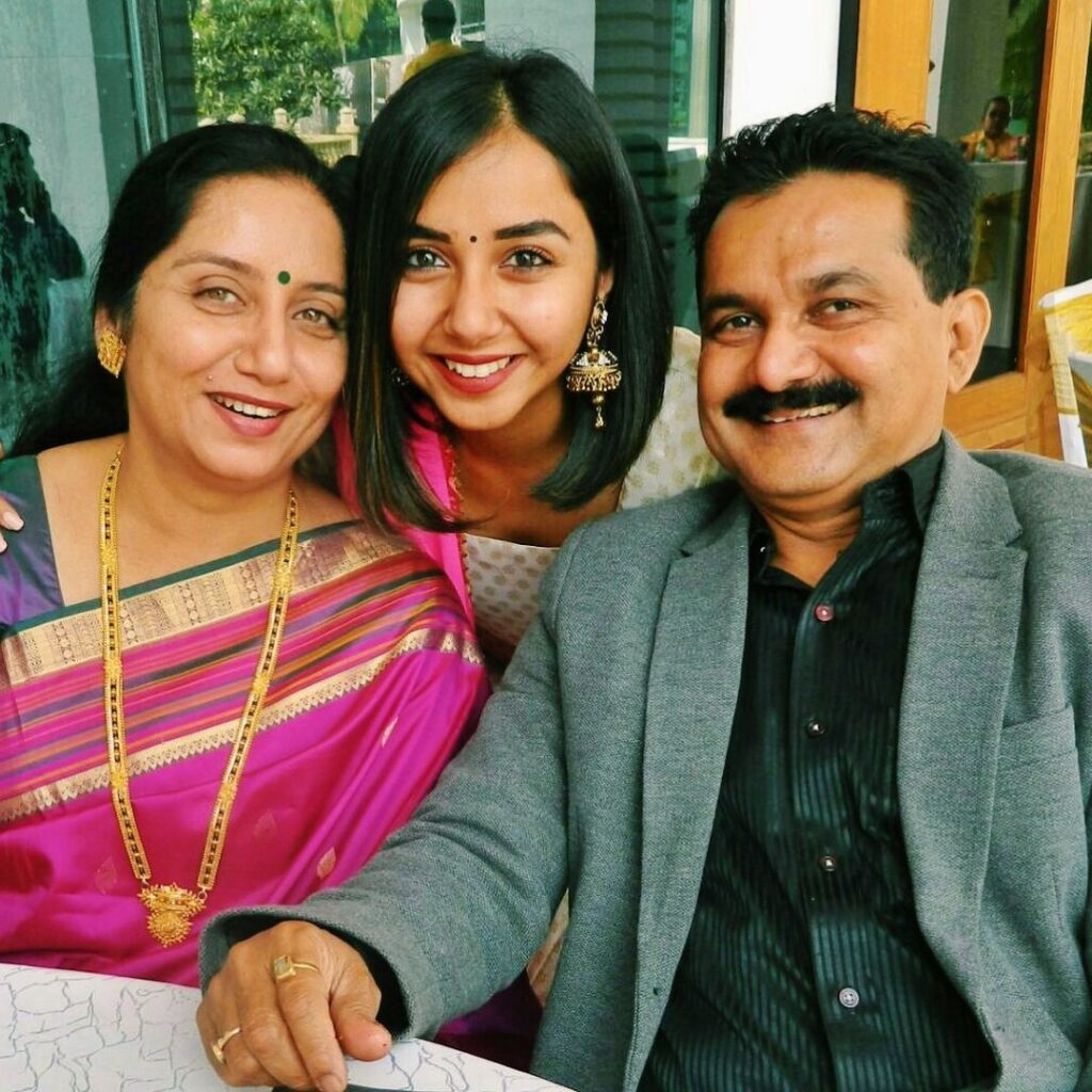 Prajakta Koli with her mother and father